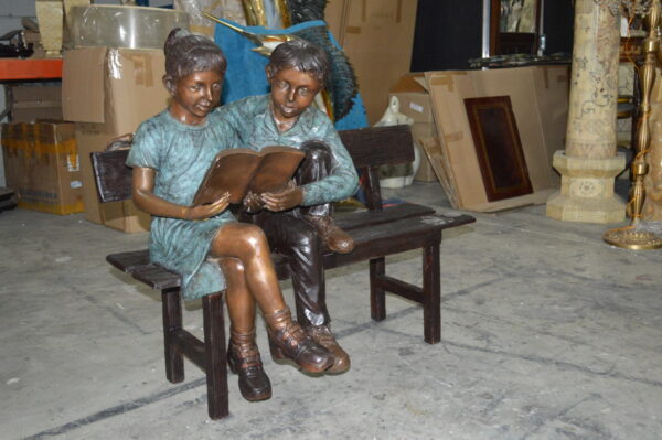 Boy and a Girl on Bench reading book bronze Statue -  Size: 43"L x 20"W x 36"H. - Image 6