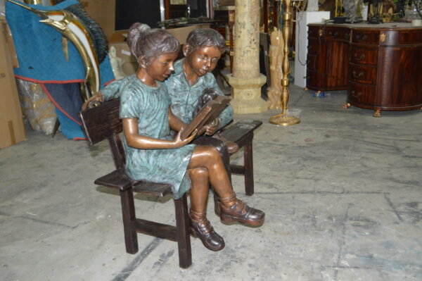 Boy and a Girl on Bench reading book bronze Statue -  Size: 43"L x 20"W x 36"H. - Image 8