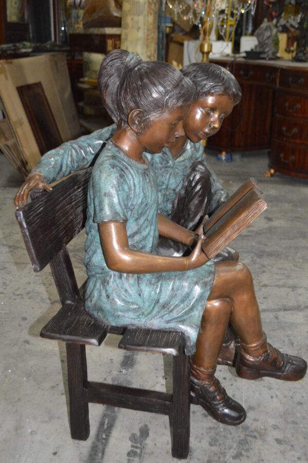 Boy and a Girl on Bench reading book bronze Statue -  Size: 43"L x 20"W x 36"H. - Image 9