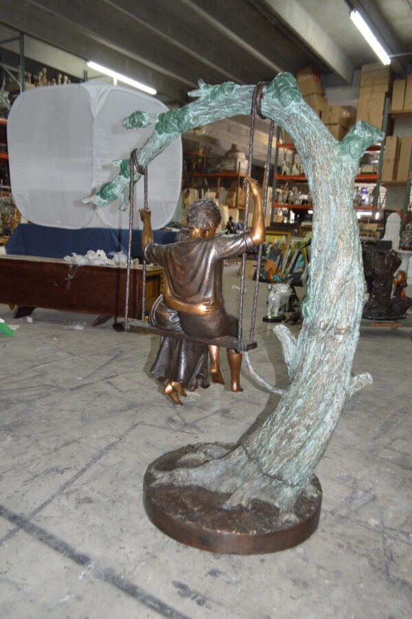 Lovers on a Swing Bronze Statue -  Size: 48"L x 32"W x 64"H. - Image 8