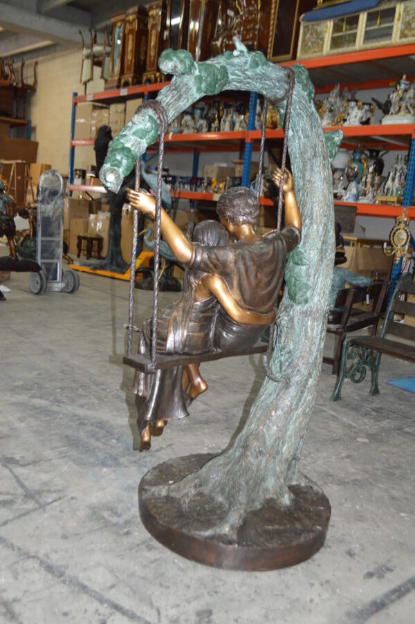 Lovers on a Swing Bronze Statue -  Size: 48"L x 32"W x 64"H. - Image 9