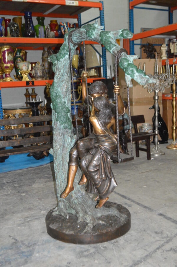 Lovers on a Swing Bronze Statue -  Size: 48"L x 32"W x 64"H. - Image 10