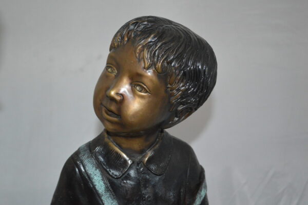 Boy and Girl on a tree log reading Bronze Statue -  Size: 37"L x 14"W x 27"H. - Image 5