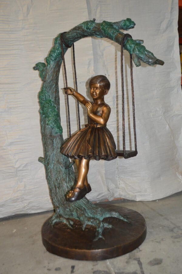 Girl on Swing 65 Bronze Statue -  Size: 44"L x 35"W x 65"H. - Image 4