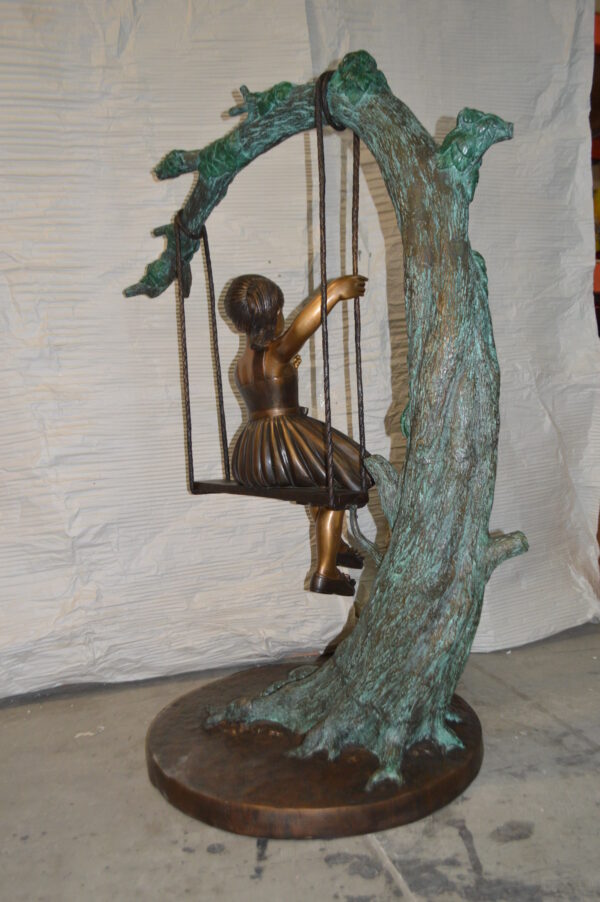 Girl on Swing 65 Bronze Statue -  Size: 44"L x 35"W x 65"H. - Image 9