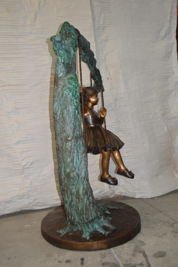Girl on Swing 65 Bronze Statue -  Size: 44"L x 35"W x 65"H. - Image 10