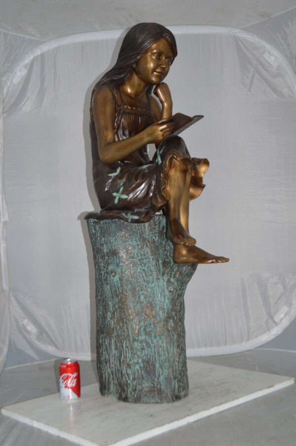 Sitting Girl on Log Reading a Book Bronze Statue -  Size: 19"L x 13"W x 48"H. - Image 4