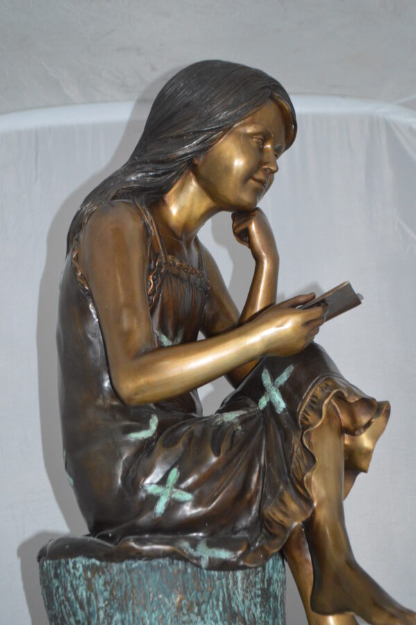 Sitting Girl on Log Reading a Book Bronze Statue -  Size: 19"L x 13"W x 48"H. - Image 6