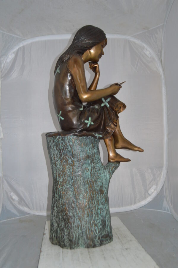 Sitting Girl on Log Reading a Book Bronze Statue -  Size: 19"L x 13"W x 48"H. - Image 7