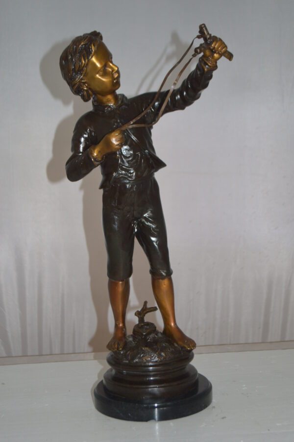 Boy with a Slingshot Bronze Statue -  Size: 12"L x 7"W x 21"H. - Image 3