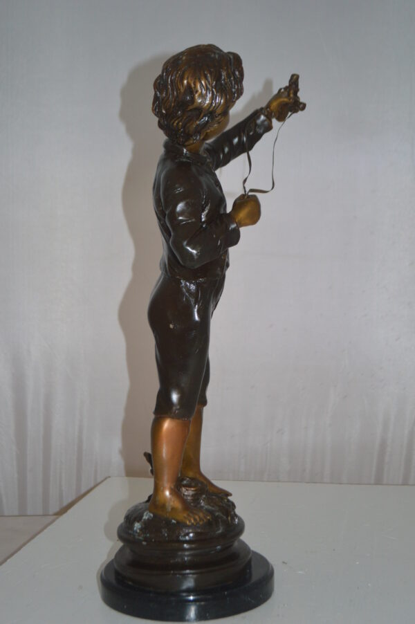 Boy with a Slingshot Bronze Statue -  Size: 12"L x 7"W x 21"H. - Image 5