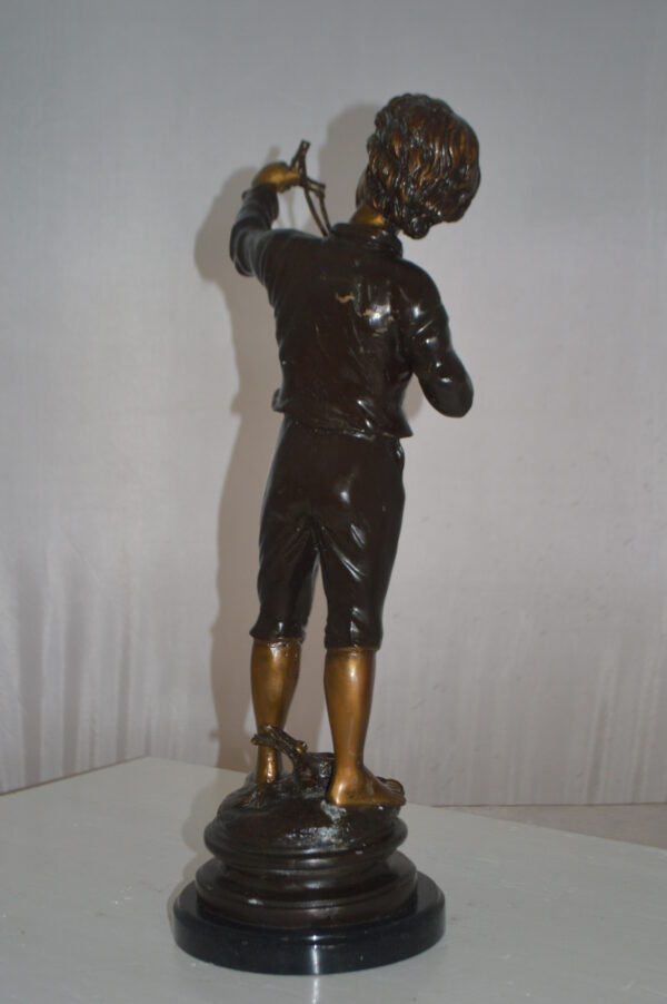 Boy with a Slingshot Bronze Statue -  Size: 12"L x 7"W x 21"H. - Image 7