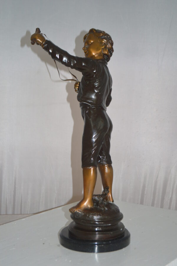 Boy with a Slingshot Bronze Statue -  Size: 12"L x 7"W x 21"H. - Image 9