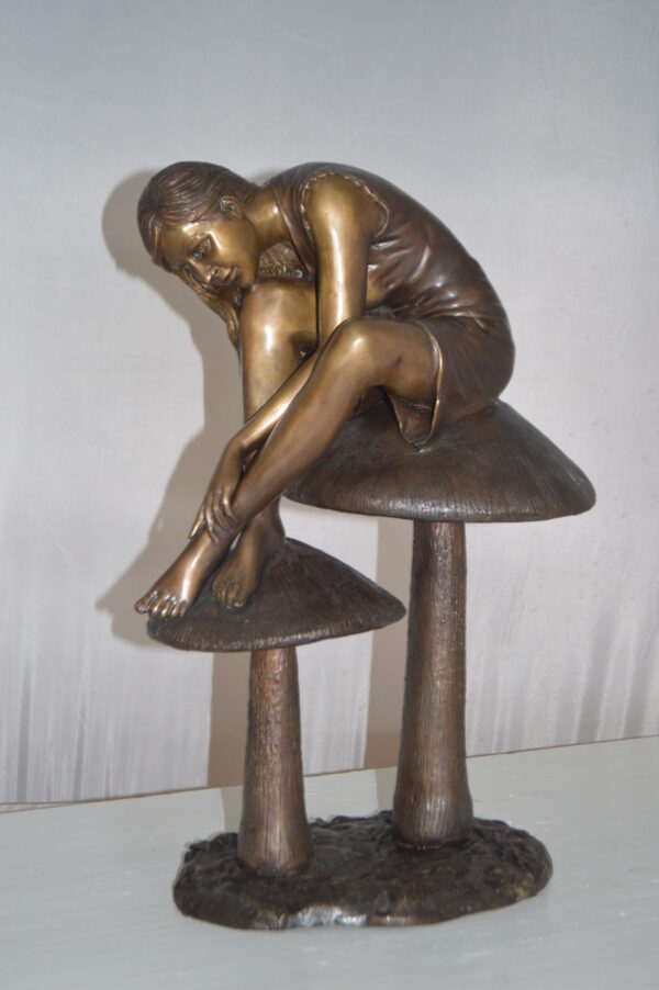 Girl sitting on Mushrooms Bronze Statue -  Size: 13"L x 11"W x 18"H. - Image 3