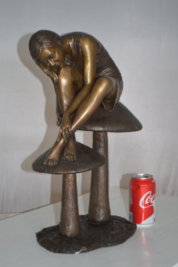 Girl sitting on Mushrooms Bronze Statue -  Size: 13"L x 11"W x 18"H. - Image 4