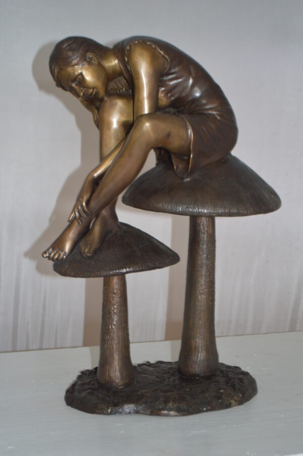 Girl sitting on Mushrooms Bronze Statue -  Size: 13"L x 11"W x 18"H. - Image 12