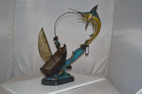 Old Man Fishing a Large Catch Bronze Statue -  Size: 27"L x 13"W x 30"H. - Image 4