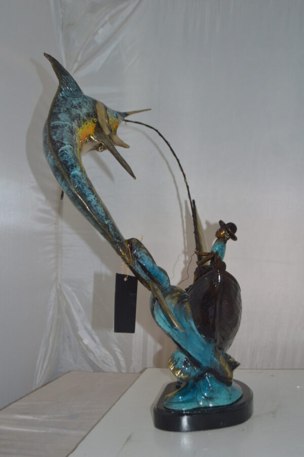 Old Man Fishing a Large Catch Bronze Statue -  Size: 27"L x 13"W x 30"H. - Image 10