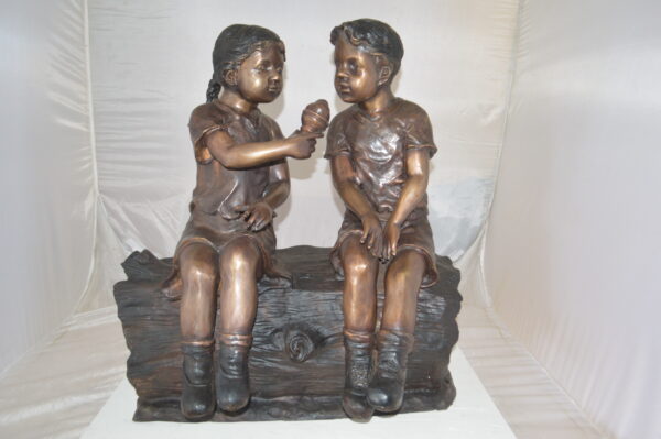 Boy and Girl enjoying an ice-cream bronze statue -  Size: 28"L x 24"W x 33"H. - Image 5