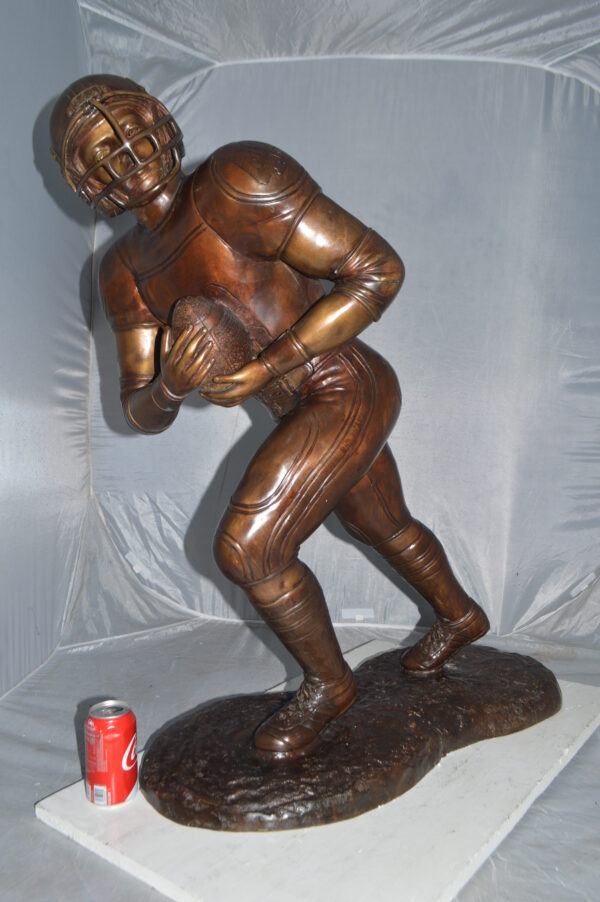 Football player Bronze Statue -  Size: 30"L x 12"W x 36"H. - Image 3