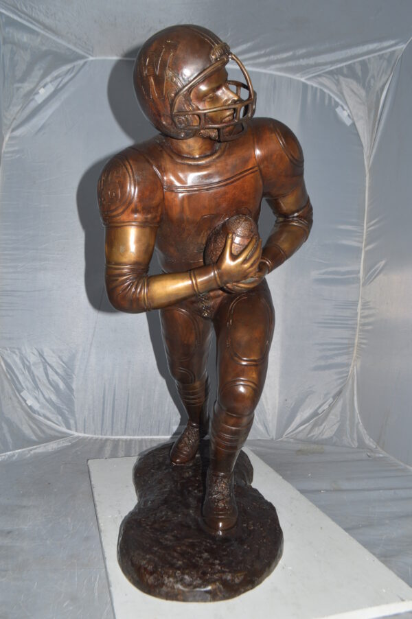Football player Bronze Statue -  Size: 30"L x 12"W x 36"H. - Image 4