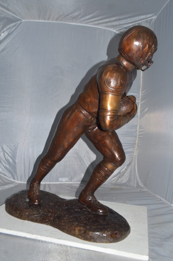Football player Bronze Statue -  Size: 30"L x 12"W x 36"H. - Image 5
