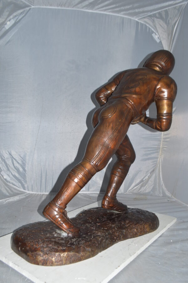 Football player Bronze Statue -  Size: 30"L x 12"W x 36"H. - Image 6