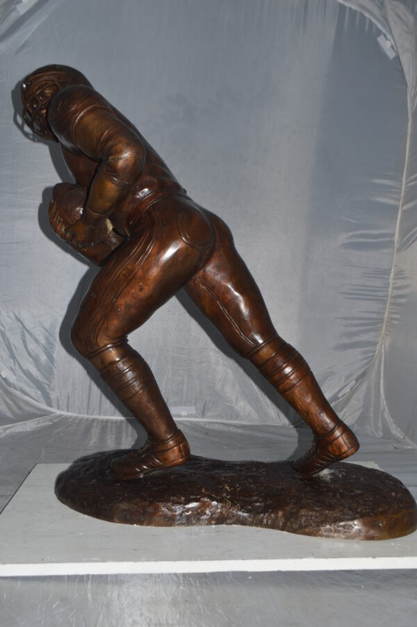 Football player Bronze Statue -  Size: 30"L x 12"W x 36"H. - Image 8
