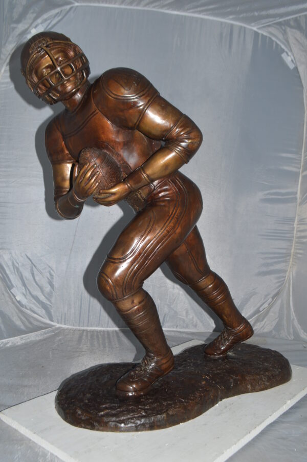 Football player Bronze Statue -  Size: 30"L x 12"W x 36"H. - Image 9