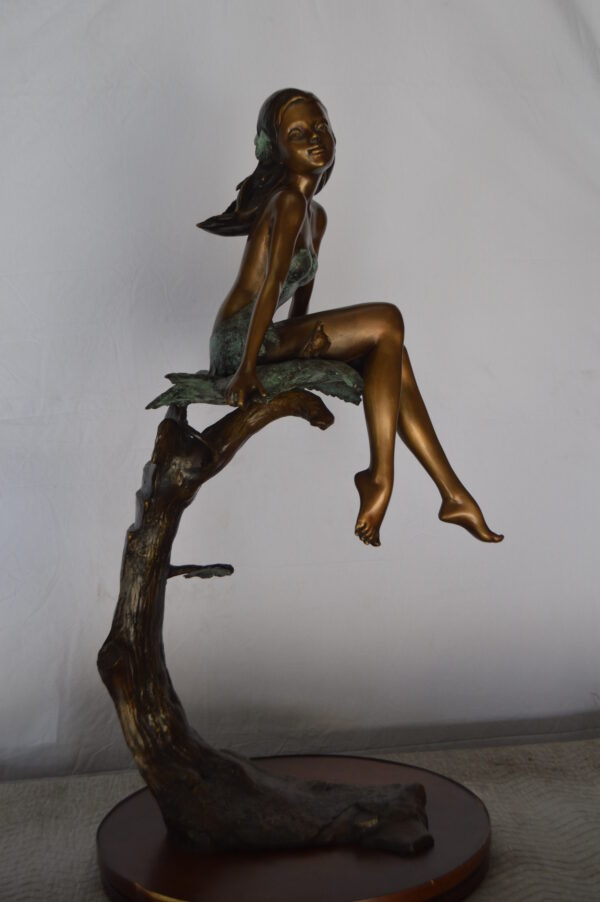 Girl on Maple Leaf Bronze Statue -  Size: 23"L x 18"W x 44"H. - Image 12