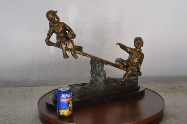 Boys Playing Seesaw on a Marble Base Bronze Statue -  Size: 22"L x 8"W x 17"H. - Image 4