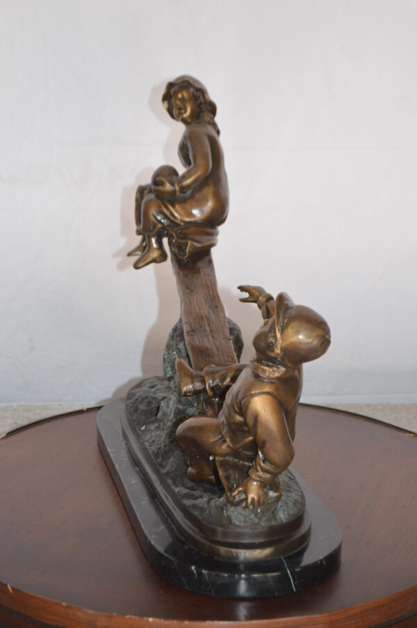 Boys Playing Seesaw on a Marble Base Bronze Statue -  Size: 22"L x 8"W x 17"H. - Image 8