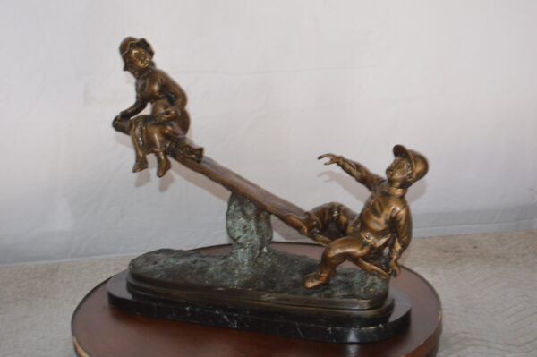 Boys Playing Seesaw on a Marble Base Bronze Statue -  Size: 22"L x 8"W x 17"H. - Image 9