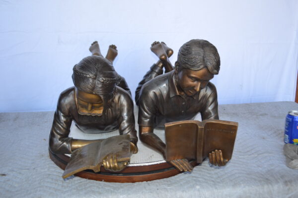 A Set of Boy and Girl Reading Books Bronze Statue -  Size: 31"L x 10"W x 14"H. - Image 5