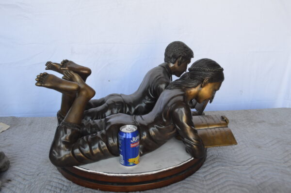 A Set of Boy and Girl Reading Books Bronze Statue -  Size: 31"L x 10"W x 14"H. - Image 7