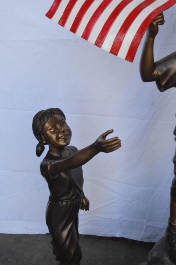 Two Kids on Rock W the American Flag Bronze Statue -  Size: 50"L x 22"W x 58"H. - Image 6