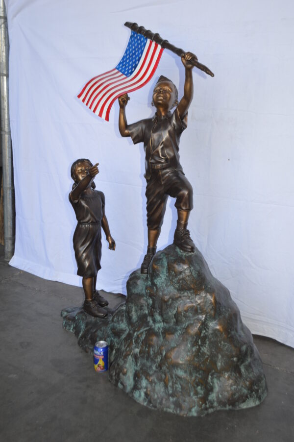Two Kids on Rock W the American Flag Bronze Statue -  Size: 50"L x 22"W x 58"H. - Image 7