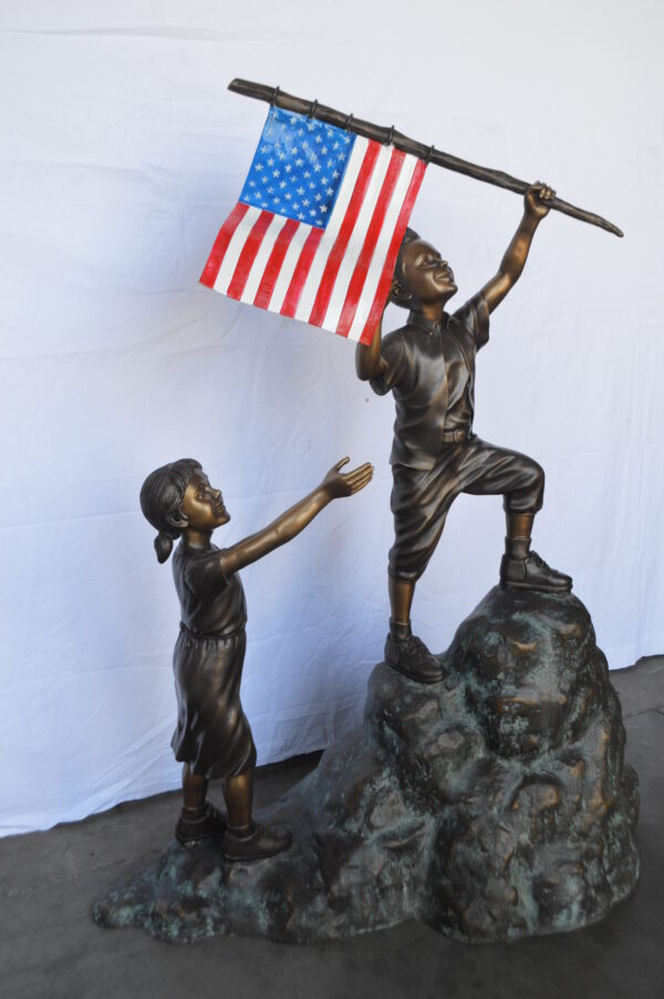 Two Kids on Rock W the American Flag Bronze Statue -  Size: 50"L x 22"W x 58"H. - Image 8