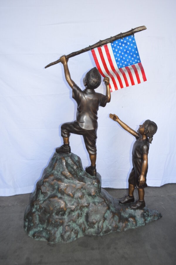 Two Kids on Rock W the American Flag Bronze Statue -  Size: 50"L x 22"W x 58"H. - Image 11