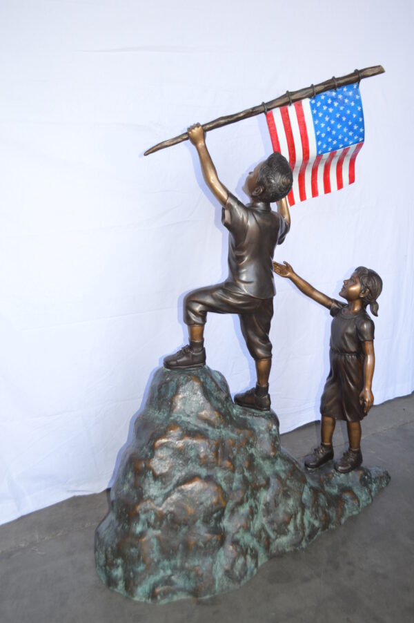 Two Kids on Rock W the American Flag Bronze Statue -  Size: 50"L x 22"W x 58"H. - Image 12