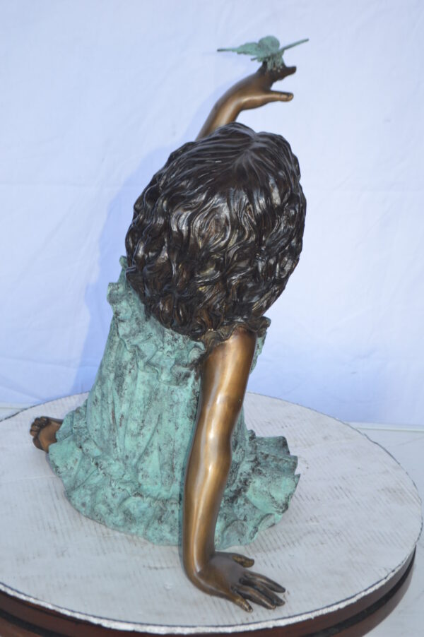 Girl Playing With Butterfly Bronze Statue -  Size: 21"L x 15"W x 19"H. - Image 9