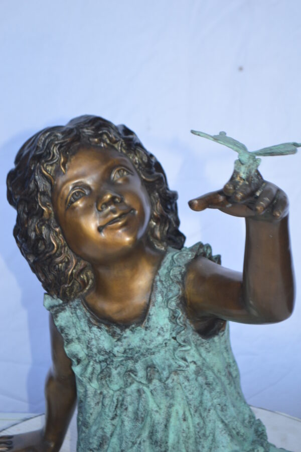 Girl Playing With Butterfly Bronze Statue -  Size: 21"L x 15"W x 19"H. - Image 11