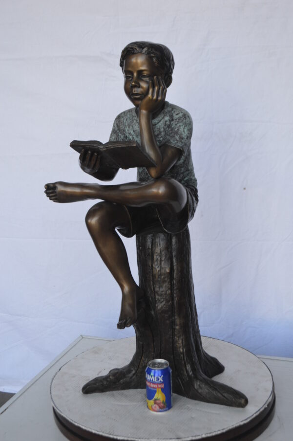 Boy Sitting on a Stump Reading a Book -  Size: 18"L x 20"W x 35"H. - Image 4