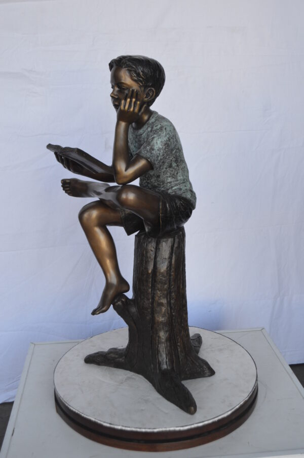 Boy Sitting on a Stump Reading a Book -  Size: 18"L x 20"W x 35"H. - Image 5