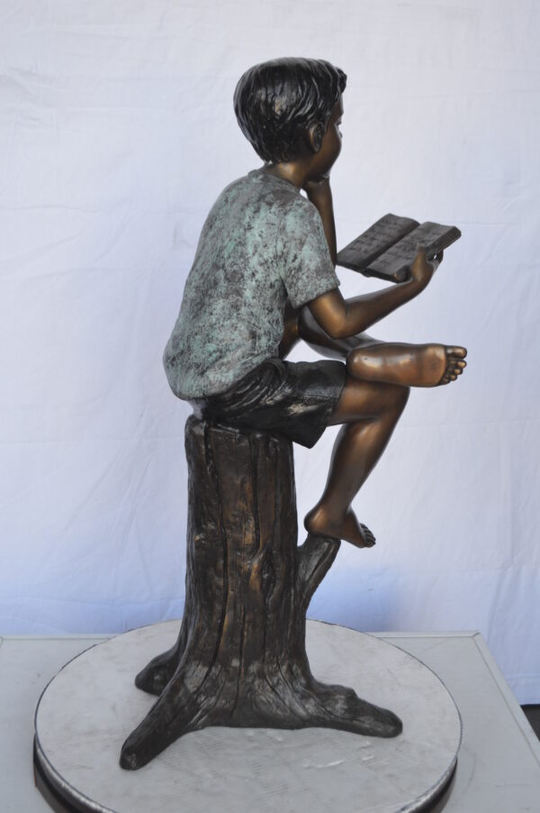 Boy Sitting on a Stump Reading a Book -  Size: 18"L x 20"W x 35"H. - Image 8