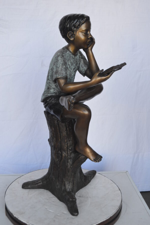 Boy Sitting on a Stump Reading a Book -  Size: 18"L x 20"W x 35"H. - Image 9