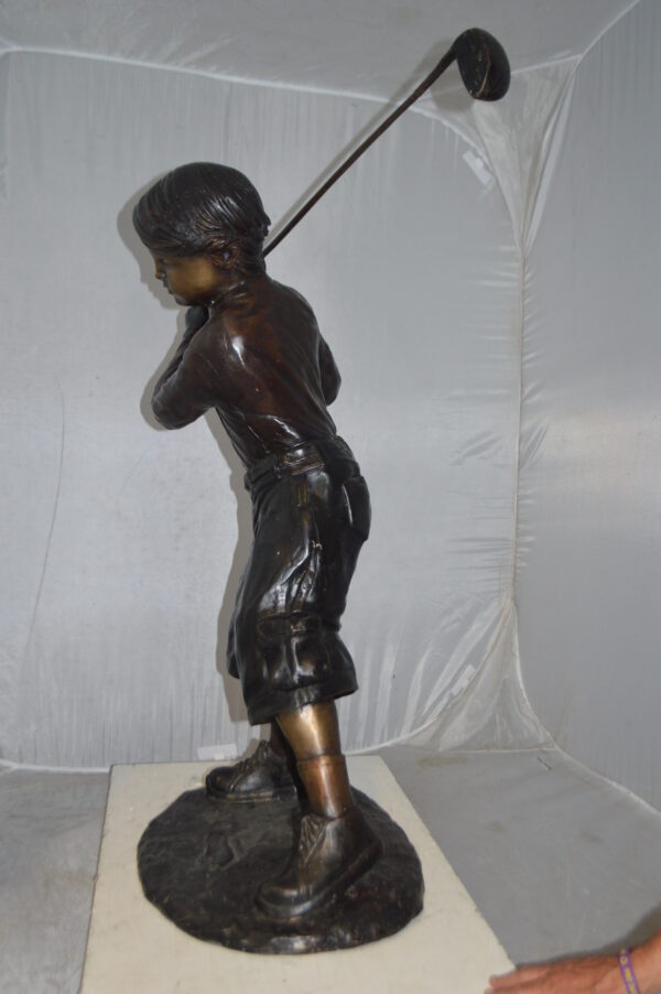 Young Boy Plays Golf Bronze Statue -  Size: 19"L x 21"W x 45"H. - Image 7