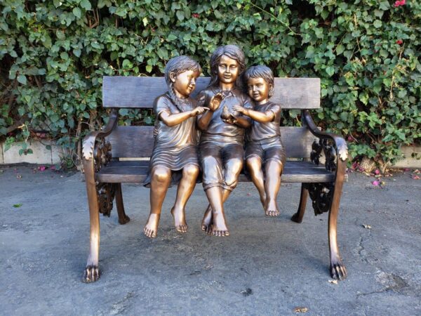Three kids on a Bench Holding a Bird Bronze Statue -  Size: 40"L x 30"W x 33"H. - Image 2