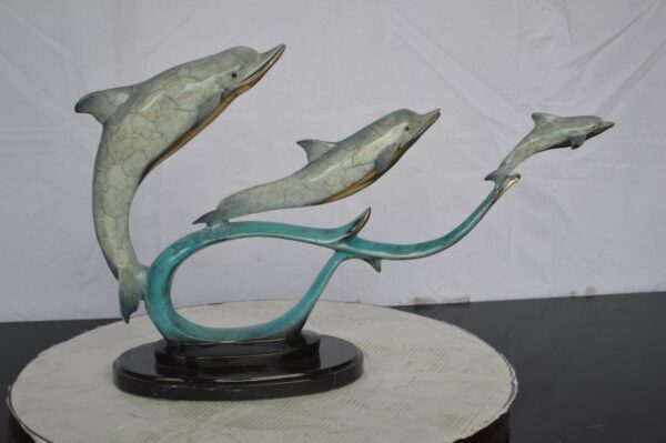 Three dolphins swimming bronze state -  Size: 26"L x 7"W x 16"H. - Image 6