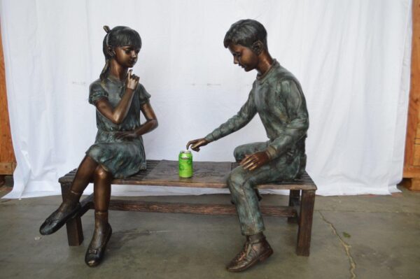 Young Couple Reviewing a World Map Bronze Statue -  Size: 32"L x 47"W x 42"H. - Image 2